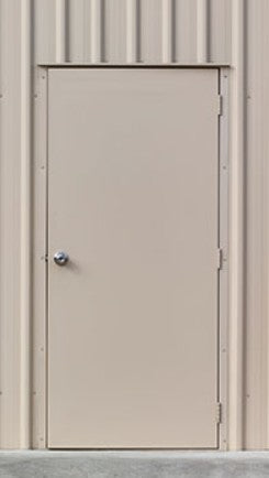 Pre-hung, dual-skin, fully metal-clad industrial personal access door for a secure solution. - Shed City