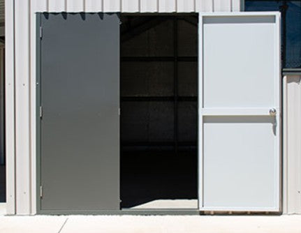 Single-skin, metal clad shed and garage personal access double door.